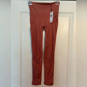 Alala leggings. Pink Sand color. Size small.